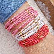 Manchette de 3 bracelets Zelaka rose blanc et corail